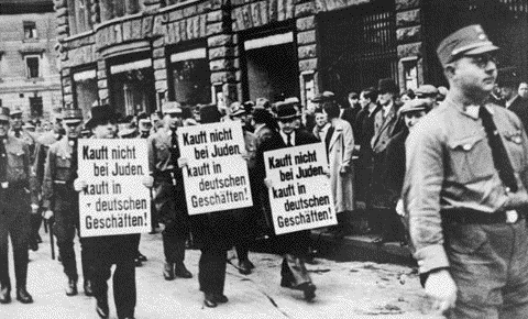 Jews Forced to
                                                          Carry
                                                          Anti-Semitic
                                                          Signs