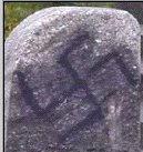 Defaced stone at
                                                          Babi Yar
                                                          monument in
                                                          Kiev
